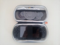 PSP 2004 Slim + Card Memorie 4 GB + 7 Jocuri + Husa Completa + Software de operare autentic (nemodat) PRET NEGOCIABIL foto