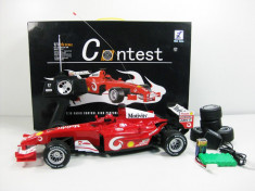 MEGA SET MASINA RADIOCOMANDATA DE FORMULA 1 COUNTER+4 CAUCIUCURI REZERVA. foto