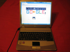 laptop intel centrino 1,4ghz (2M cash) 512RAM 40GB hdd DVD/CDRW WIFI foto