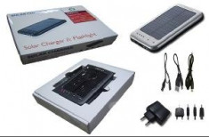 Incarcator solar portabil si acumulator extern 2600 mAh . incarcator niversal pentru telefoane mobile foto