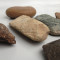 AuX: Lot piese, unelte neolitic format din doua topoare de mana, ciocan din silex, fragmente de idoli si nasture de ceramica, garantez autenticitatea!