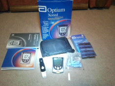 Glucometru Optium Xceed,ca nou (deschis si testat), baterie noua, iluminare ecran, teste expirate. Precizie maxima, testare in 5 secunde! foto