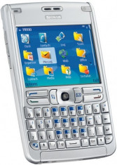 Nokia E61 silver nou nout sigilat nerecarosat,neumblat in el, la cutie pachet complet 12luni garantie cu toate accesoriile!PRET:420ron foto