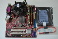 KIT LGA 775 MSI G31M3 V2 + Procesor Intel QuadCore Xeon E5320 1.86Ghz + Cooler + 4GB DDR2 + HDD 250GB sigilat foto