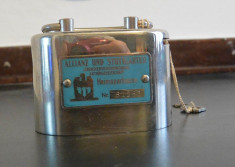 Vintage-Pusculita Money Box din tabla,cheie,perfect functionala..GERMANIA foto