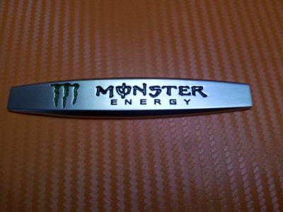 Emblema Monster metalica foto