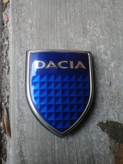 Vand emblema portbagaj Dacia Logan foto