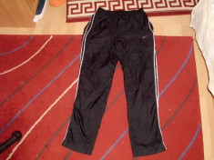 PANTALONI.NIKE.MAR.M.DIN FAS.CU BUZUNARE LATERALE foto