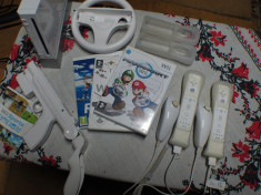 Vand consola WII + accesorii + jocuri (2 telecomenzi + 2 nunchuck-uri + 2 senzori wiimotion) foto