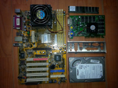 Vand PC la 100 lei proc AMD de 1,7Ghz , 512RAM, HDD 80GB cu placa video AGP 128mega si tot incorporat (fara sursa si carcasa) foto