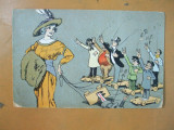 Carte postala ilustrator caricatura Munchen J. S. u. Co. M. 1023 femeie cu palarie si haina blana tragand de sfoara dispozitive cu barbati pe roti, Necirculata, Printata, Europa