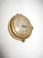 Viola- ceas de mana vechi de dama din alama nefunctional foto