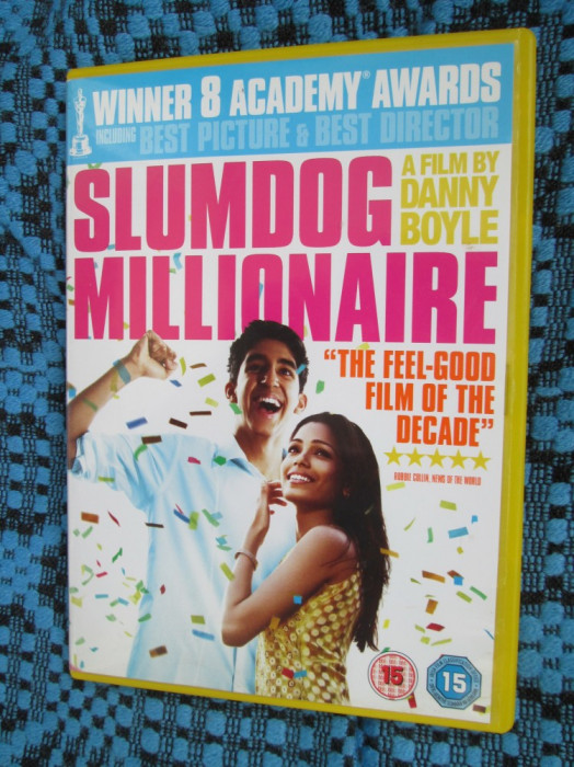 SLUMDOG MILLIONAIRE (VAGABONDUL MILIONAR) - film DVD (original din ANGLIA, in stare impecabila!!!)