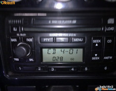 radioCd player original FORD 6006E cu magazia de 6 cd-uri incorporata functioneaza dar cu probleme defect 1,8 DIN compatibil cu forduri anii 1995-2004 foto