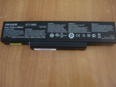 Baterie laptop BTY-M66 10.8Vdc 4400mAh lithium de pe un laptop MSI MS-163D foto