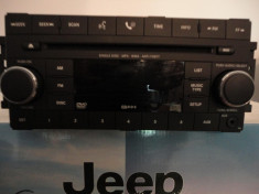 CD Player MP3 WRANGLER,LIBERTY,NITRO nou original chrysler- 05064053AK foto