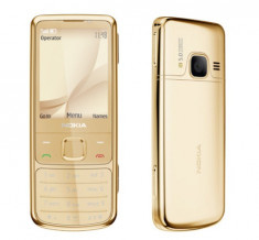 Nokia 6700 gold noii noute la cutie cu toate accesorile oferite de producator foto