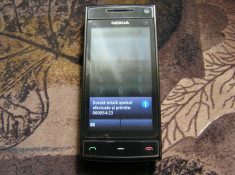 Nokia X6 32Gb foto