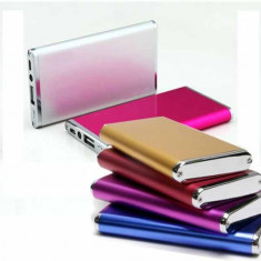 Baterie externa de 5600 MAH pentru IPAD, IPOD , IPHONE 3G , 3GS , 4G si 4GS , SAMSUNG , SONY , BLACKBERRY , HTC . Culori : Argintiu , Negru si Roz foto