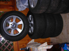 Cauciucuri de iarna DUNLOP Sport Winter 3D 235 / 65 / R17 cu jante Volvo XC60 folosite foto