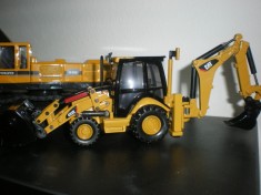 vand buldoexcavator cat 1:50 foto
