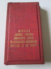 MEDALIA SECURITATII PENTRU SERVICII DEOSEBITE ADUSE IN APARAREA ORINDUIRII SOCIALE SI DE STAT+CUTIA ORIGINALA foto