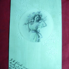Ilustrata- Felicitare- Femeie cu flori , in relief , stamp. albastra Leordeni , circ. 1911