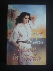 NORA ROBERTS - NASCUT IN FLACARI foto