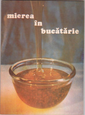 APIMONDIA - MIEREA IN BUCATARIE foto