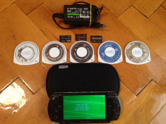 PSP 2004 (card 1gb,2gb,4gb, husa sony orignala, 5 jocuri, incarcator) foto