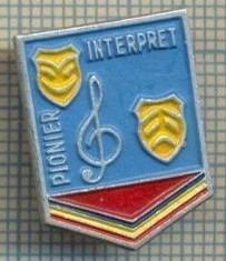910 INSIGNA - PIONIER INTERPRET-anii'80,cand mai aveau putin si le faceau din hartie,de atata economie disperata-starea ce se vede