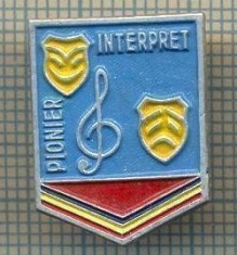 923 INSIGNA -PIONIER INTERPRET -anii'80,cand mai aveau putin si le faceau din hartie,de atata economie disperata-starea ce se vede