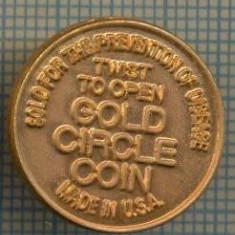 1009 INSIGNA - TWIST TO OPEN GOLD CIRCLE COIN -MADE IN USA -SOLD FOR THE PREVENTION OF DISEASE-emisa in scop caritabil -starea ce se vede.