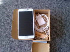Samsung Galaxy S5 alb neverloked folosit la cutie,garantie pachet complet cu toate accesoriile oferite de producator! PRET:1730lei foto