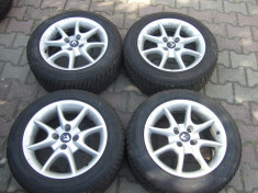 jante genti aliaj 4x100 R16 renault dacia anvelope cauciucuri 205 55 16 iarna 205 55 R16 dunlop an 2011 profil peste 7mm ca noi foto