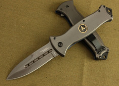 BRICEAG. CUTIT Militar S.U.A. Lama marcata .U.S.A. STRIDER KNIFE. foto