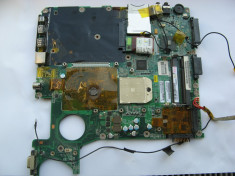 Placa de baza defecta laptop Toshiba A300D socket S1 pentru piese foto