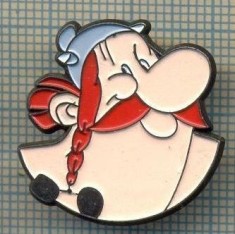 1240 NEW INSIGNA -PERSONAJE DE DESENE ANIMATE - OBELIX -starea care se vede