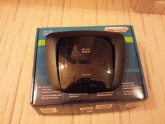 Vand router Linksys E1000 foto