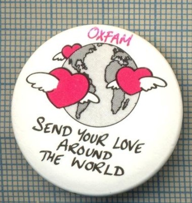 2025 INSIGNA - OXFAM-SEND YOUR LOVE AROUND THE WORLD(TRIMITE DRAGOSTEA TA IN JURUL LUMII)-SIMBOL-INIMI CU ARIPI IN JURUL GLOBULUI-starea care se vede foto