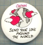 2027 INSIGNA - OXFAM-SEND YOUR LOVE AROUND THE WORLD(TRIMITE DRAGOSTEA TA IN JURUL LUMII)-SIMBOL-INIMI CU ARIPI IN JURUL GLOBULUI-starea care se vede