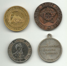 4 medalii diverse foto