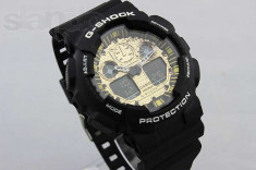 CASIO G-SHOCK GA 100, BLACK-GOLD EDITION foto