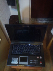 Laptop Asus x59SL imbunatatit+geanta laptop+fostul procesor T5450 foto