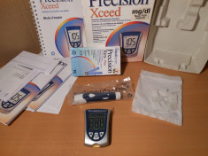 Glucometru Precision Xceed foto