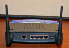 vand router Linksys wrt54gl foto