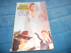 SIDNEY SHELDON - STELELE APROAPE STRALUCESC foto