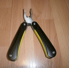 Patent multifunctional cu husa pentru transport la centura gen briceag foto