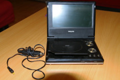 DVD player portabil PHILIPS PET706/05 citeste si MP3, video in/out,coaxial ,alimentator auto foto