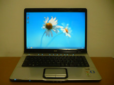 LAPTOP HP DV 6500, DISPLAY 15,4 WIDE, AMD DUAL CORE TL-56, 2 GB DDR2, 250 GB HDD,HDMI,WIRELESS WEBCAM, CITITOR CARDURI SI AMPRENTA, BATERIA 1 ORA. foto